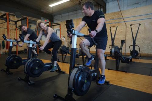 greg, cady, john in gym